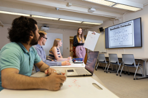 Students listening to a presentation